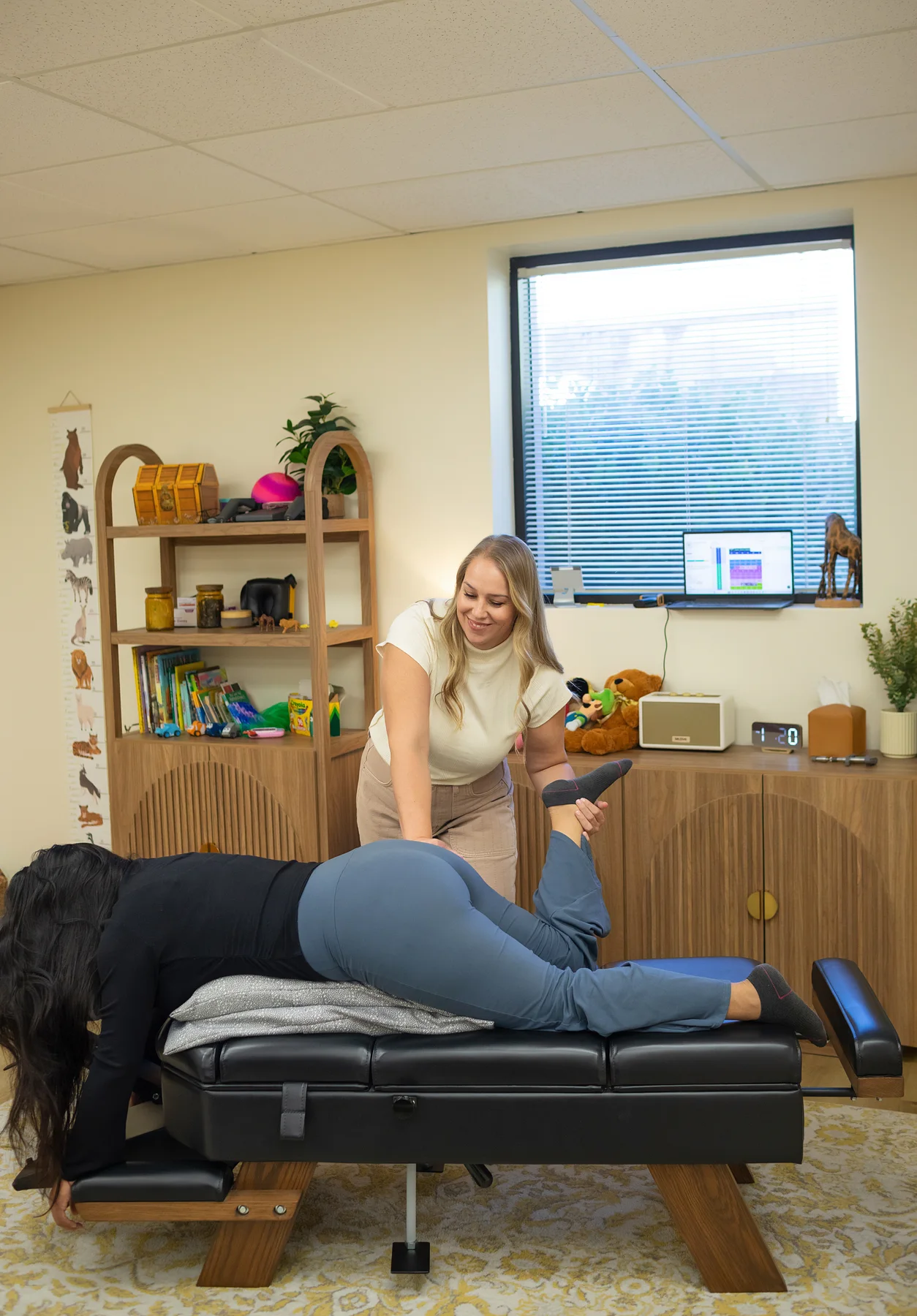 Pregnant patient supported in a side-lying position during prenatal chiropractic care in Temecula