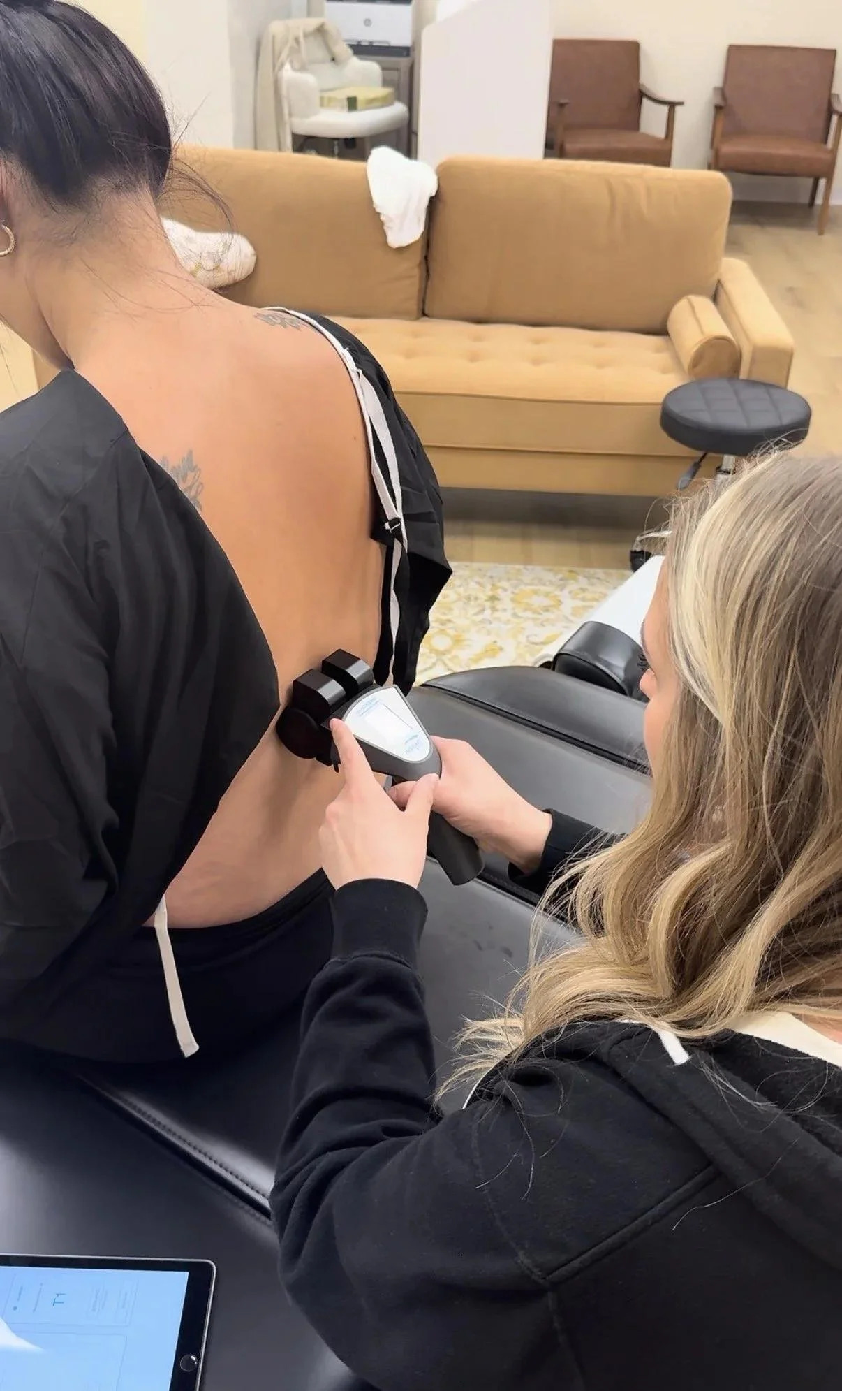 Dr. Jennifer Gordon checking lower back alignment